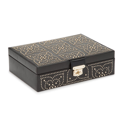 Take a trip to an exotic and intoxicating place, leather and gold studding whirling together, creating patterns within patterns. Make a statement at home with the Marrakesh Flat Jewelry box. Features intricate studs on smooth leather, full mirror, gold finished hardware, and WOLF’s patented LusterLoc™. Release the dervish in you!